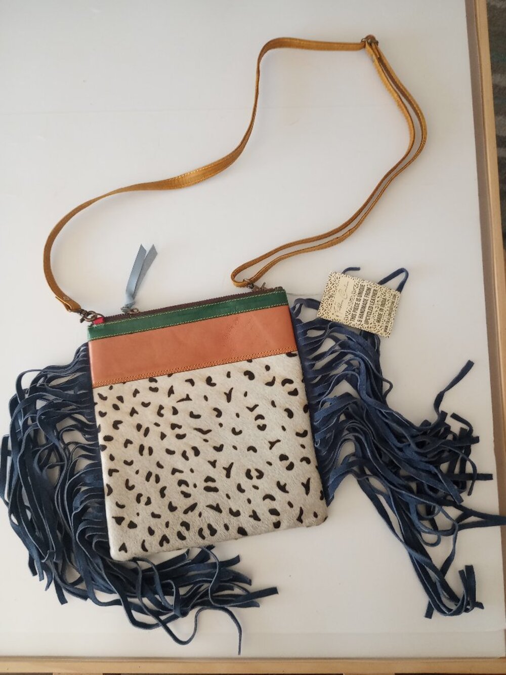 Folklore Couture real leather and hair handbag